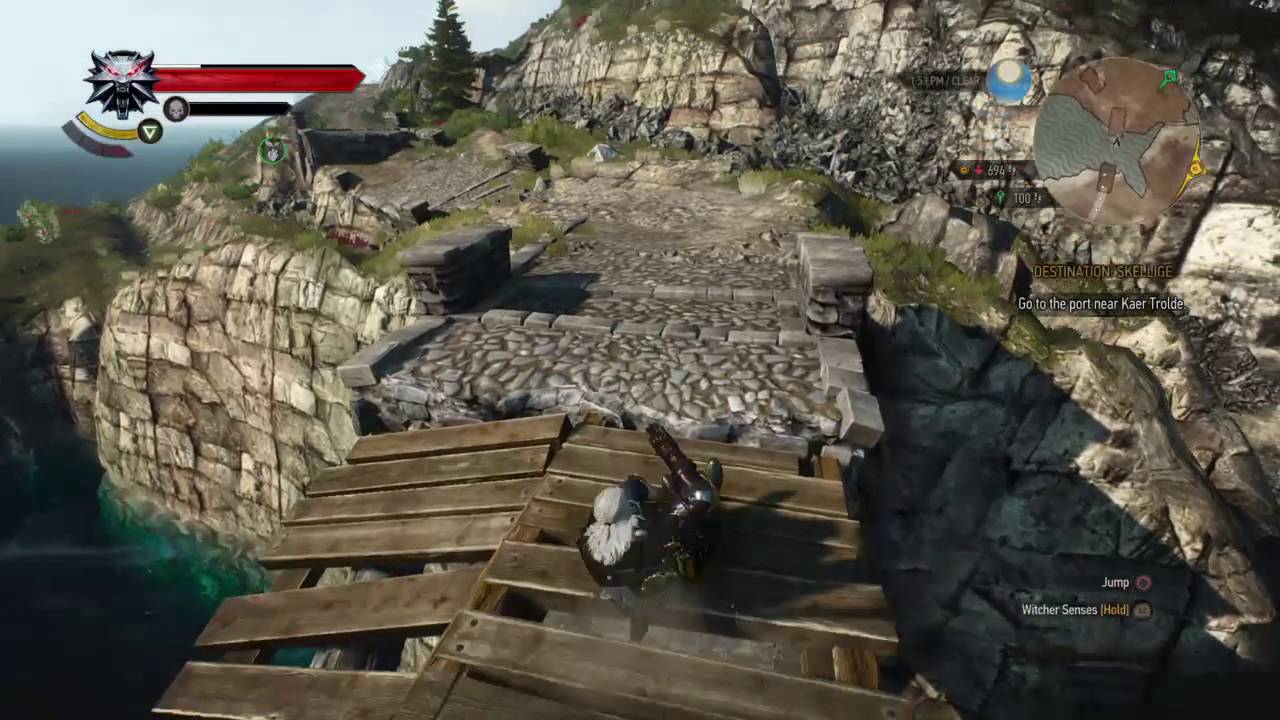 Geralt rolling out of an attack